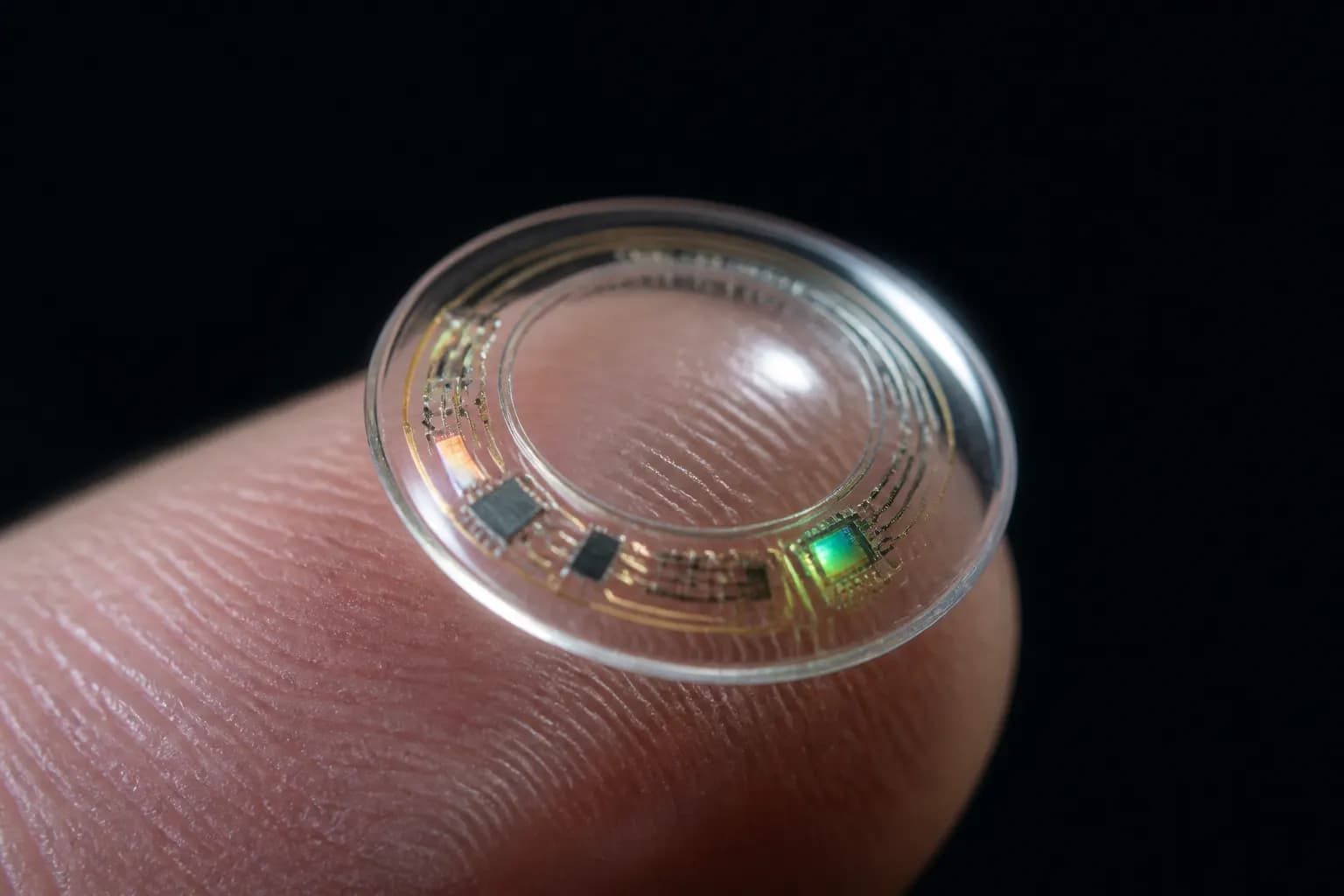 Macro photograph of a transparent contact lens with faint nanophotonic traces.